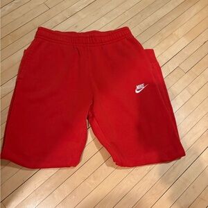 Red nike joggers